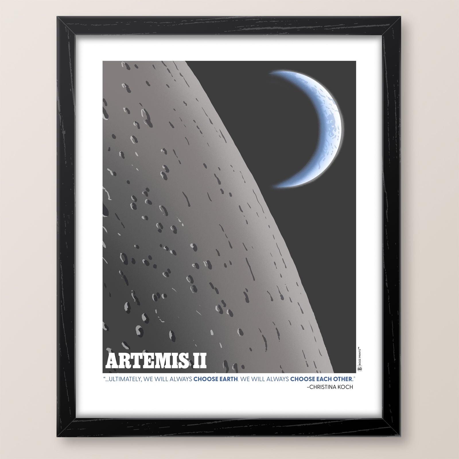 Framed poster of a space-themed artwork with 'Artemis II' text and celestial background.